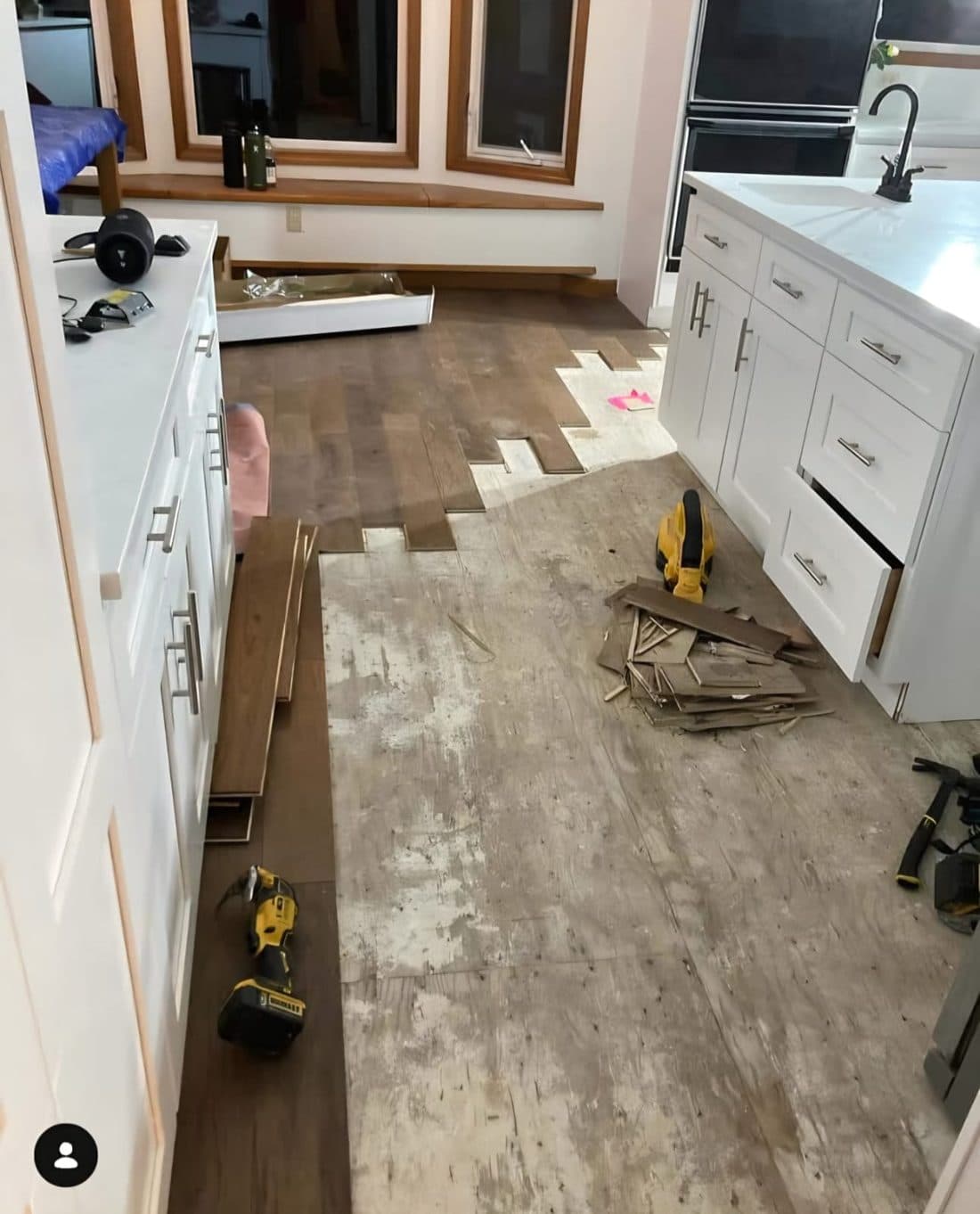 Engineered Flooring Repair — planks being installed